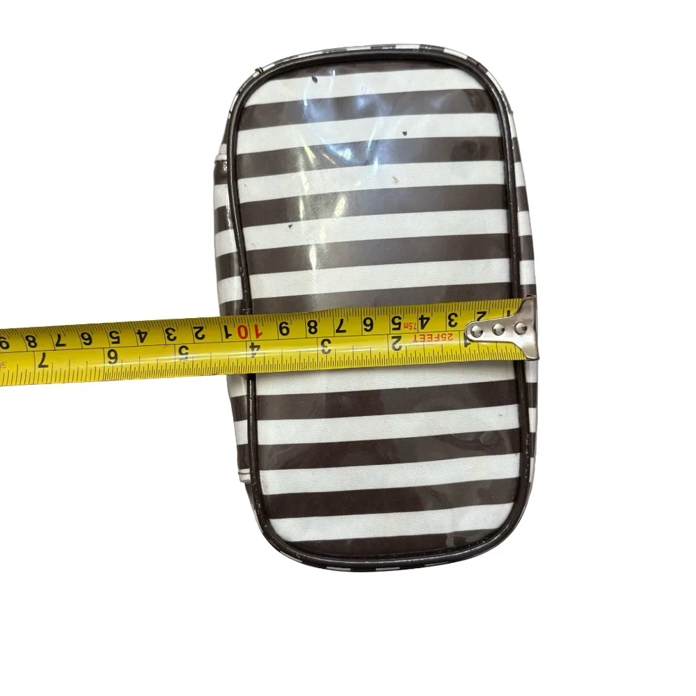 Henri bendel white & brown striped cosmeti case bag.